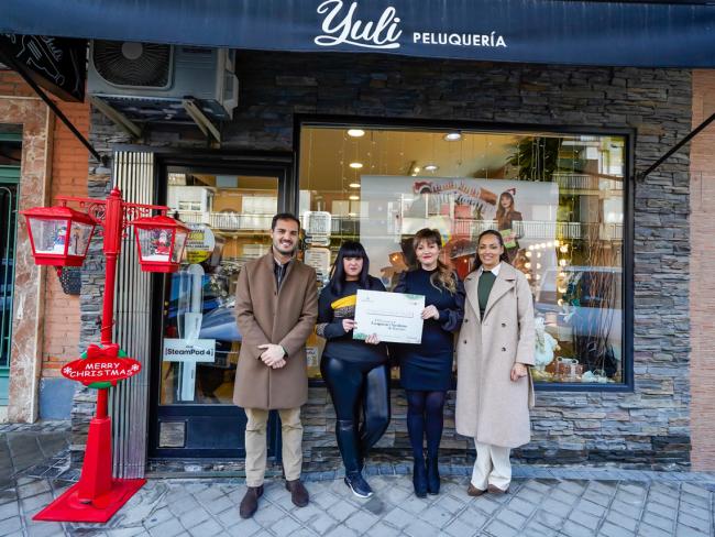 Premio especial del Jurado con una dotación de 150 euros y diploma al titular del comercio Yuli Peluquería  situado en C/ Palermo, 3